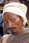 Beware the Glare! Fake Sadhu eyes prospective 'donors'.